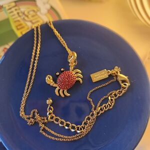 kate spade Gold Crab Necklace with Red and Black Accents